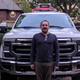 Our own Jason Torchiniky in front of a 2020 Ford F-250 Tremor.